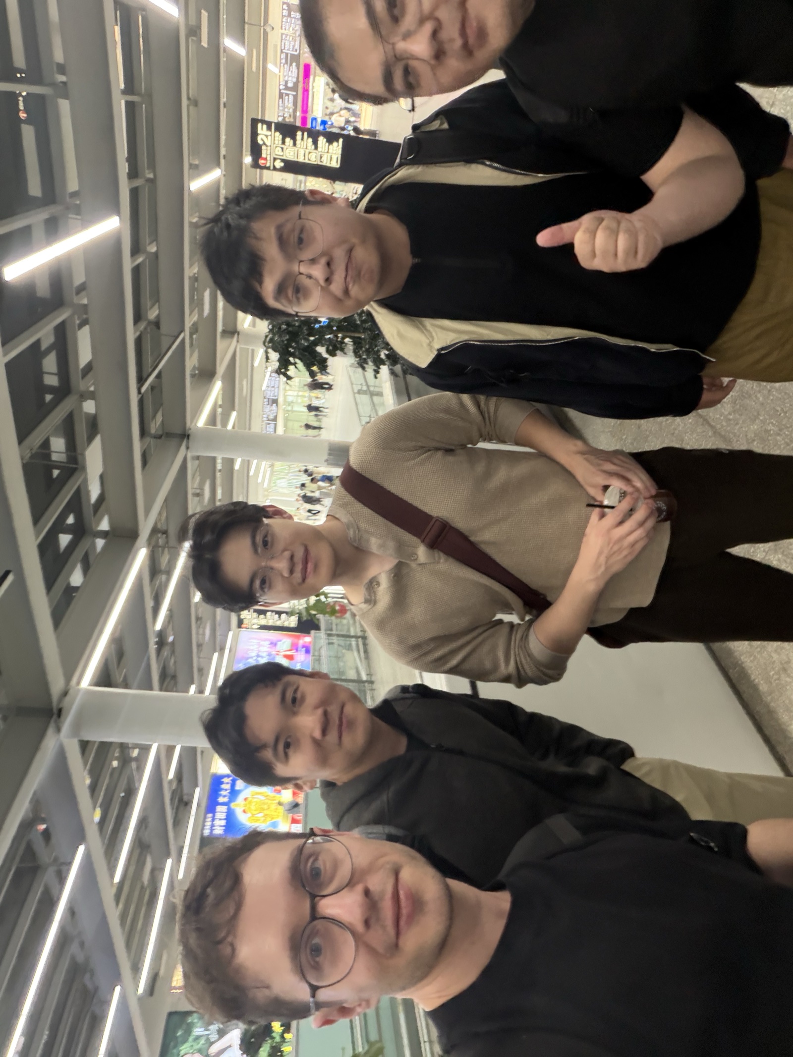 Dom with Arthur Wang Yuqiao (王玉乔), AgentBull founder, at the airport after landing